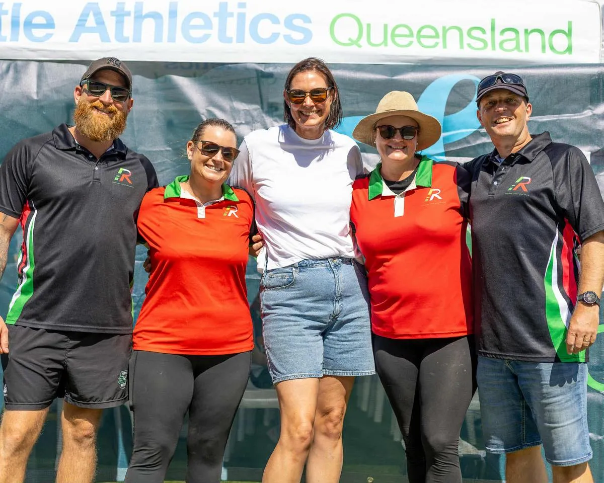 group-smiling-at-event
